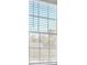 Window with white blinds and view of neighborhood at 1112 Moss Grove Dr, Moncks Corner, SC 29461