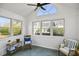 Bright sunroom with vaulted ceilings, large windows, and slate floors, providing a relaxing space at 9049 Delancey Cir, North Charleston, SC 29406