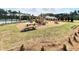 Community playground and picnic tables surrounded by landscaping at 3005 Dalmore Dr, Ravenel, SC 29470