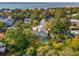 Aerial view of home with pool, lush landscaping, and water views at 436 Church St, Mount Pleasant, SC 29464