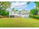 Large backyard with beautiful home and refreshing pool at 436 Church St, Mount Pleasant, SC 29464