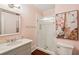 Bathroom with a walk-in shower and pink walls at 436 Church St, Mount Pleasant, SC 29464