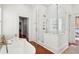 Spa-like bathroom with walk-in shower and freestanding tub at 436 Church St, Mount Pleasant, SC 29464