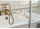 Bathroom detail showing a white bathtub with caddy at 436 Church St, Mount Pleasant, SC 29464