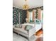 Bedroom with a post bed and patterned wallpaper at 436 Church St, Mount Pleasant, SC 29464