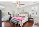 Main bedroom with Peloton bike and hardwood floors at 436 Church St, Mount Pleasant, SC 29464