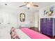 Bright bedroom with a comfortable bed, built-in closets, and hardwood floors at 436 Church St, Mount Pleasant, SC 29464