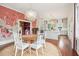 Bright dining area with a large round table and statement wallpaper at 436 Church St, Mount Pleasant, SC 29464