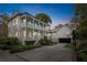 Two story home with wrap around porch and detached garage at 436 Church St, Mount Pleasant, SC 29464