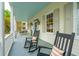 Spacious front porch with rocking chairs and outdoor seating at 436 Church St, Mount Pleasant, SC 29464