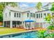 Back of house with pool, patio, and lounge chairs at 436 Church St, Mount Pleasant, SC 29464