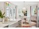 Bright kitchen features white cabinets, marble countertops, and stainless steel appliances at 436 Church St, Mount Pleasant, SC 29464
