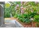 Landscaped garden with flowering plants and pathway at 436 Church St, Mount Pleasant, SC 29464