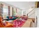 Elegant living room featuring a colorful rug and statement art at 436 Church St, Mount Pleasant, SC 29464
