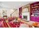 Spacious living room featuring a fireplace, built-in shelving, and comfortable seating at 436 Church St, Mount Pleasant, SC 29464