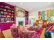 Bright living room with colorful rug and eclectic decor at 436 Church St, Mount Pleasant, SC 29464