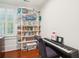 Home office featuring built in shelving and a piano at 436 Church St, Mount Pleasant, SC 29464