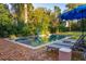 Inviting swimming pool with brick patio and lounge chairs at 436 Church St, Mount Pleasant, SC 29464