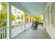 Relaxing front porch with rocking chairs, offering a view of the neighborhood at 436 Church St, Mount Pleasant, SC 29464
