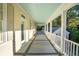Spacious back porch with white railings and a view of the backyard at 436 Church St, Mount Pleasant, SC 29464