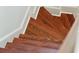 Elegant wooden staircase with rich, dark wood adding warmth to the home at 436 Church St, Mount Pleasant, SC 29464
