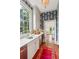 Modern wet bar with a marble countertop and a built-in wine cooler at 436 Church St, Mount Pleasant, SC 29464