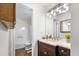 Bright bathroom featuring a vanity, sink, toilet, and shower tub combination at 4796 Champion Way # C, North Charleston, SC 29418