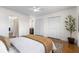Spacious bedroom featuring a king bed, ensuite bathroom, and double door closets at 4796 Champion Way # C, North Charleston, SC 29418