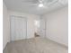 Bright bedroom featuring plush carpet, a bi-fold door closet, and access to the hallway at 4796 Champion Way # C, North Charleston, SC 29418