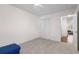 Bedroom featuring neutral carpet with closet and view of a bed at 4796 Champion Way # C, North Charleston, SC 29418