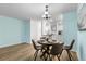 Dining room featuring a round table with place settings and easy access to kitchen at 4796 Champion Way # C, North Charleston, SC 29418