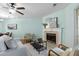 Living room showcasing a cozy fireplace, comfortable seating, and contemporary decor at 4796 Champion Way # C, North Charleston, SC 29418