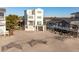 Elevated view of beach house, showcasing its unique design and beachfront location at 1579 E Ashley Ave, Folly Beach, SC 29439