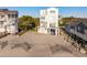 Elevated view of beach house, showcasing its unique design and beachfront location at 1579 E Ashley Ave, Folly Beach, SC 29439