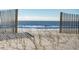 Steps to the beach through a dune walkover at 1579 E Ashley Ave, Folly Beach, SC 29439