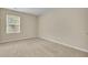 Spacious bedroom with neutral carpeting and window at 1625 Pimlico Blvd, Moncks Corner, SC 29461