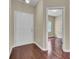 Hardwood floor entryway with door to an adjacent room at 1625 Pimlico Blvd, Moncks Corner, SC 29461