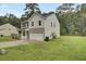 Two-story house with attached garage, and green lawn at 1625 Pimlico Blvd, Moncks Corner, SC 29461