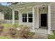 Front entrance with columns, and access to the home at 1625 Pimlico Blvd, Moncks Corner, SC 29461