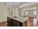 Open kitchen with island and views into the living room at 1625 Pimlico Blvd, Moncks Corner, SC 29461