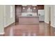 Modern kitchen with dark cabinets and stainless steel appliances at 1625 Pimlico Blvd, Moncks Corner, SC 29461