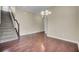 Elegant staircase with hardwood floors and wooden railing at 1625 Pimlico Blvd, Moncks Corner, SC 29461