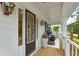 Inviting front porch with rocking chairs and stylish door at 1644 Siloh Dr # 476, Mount Pleasant, SC 29466