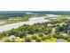 Drone view of waterfront property and neighborhood at 2972 Anchor Watch Dr, Wadmalaw Island, SC 29487