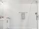 Clean, modern bathroom with white subway tile shower and white vanity at 2972 Anchor Watch Dr, Wadmalaw Island, SC 29487