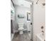 Modern bathroom with subway tile shower and white vanity at 2972 Anchor Watch Dr, Wadmalaw Island, SC 29487