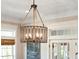 Elegant chandelier with a cage design, perfect for a dining room at 2972 Anchor Watch Dr, Wadmalaw Island, SC 29487