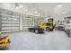 Bright and spacious garage with high ceilings and multiple garage doors at 2972 Anchor Watch Dr, Wadmalaw Island, SC 29487