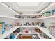 Walk-in pantry offers ample shelving for storage needs at 2972 Anchor Watch Dr, Wadmalaw Island, SC 29487