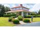 Community pavilion with picnic tables and fireplace at 2972 Anchor Watch Dr, Wadmalaw Island, SC 29487
